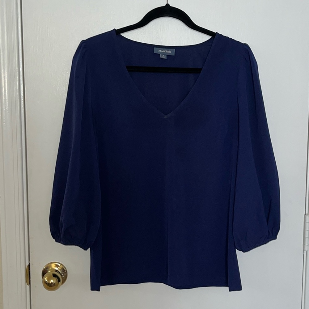 Cute navy blue blouse with puffed mid sleeves and V-neck